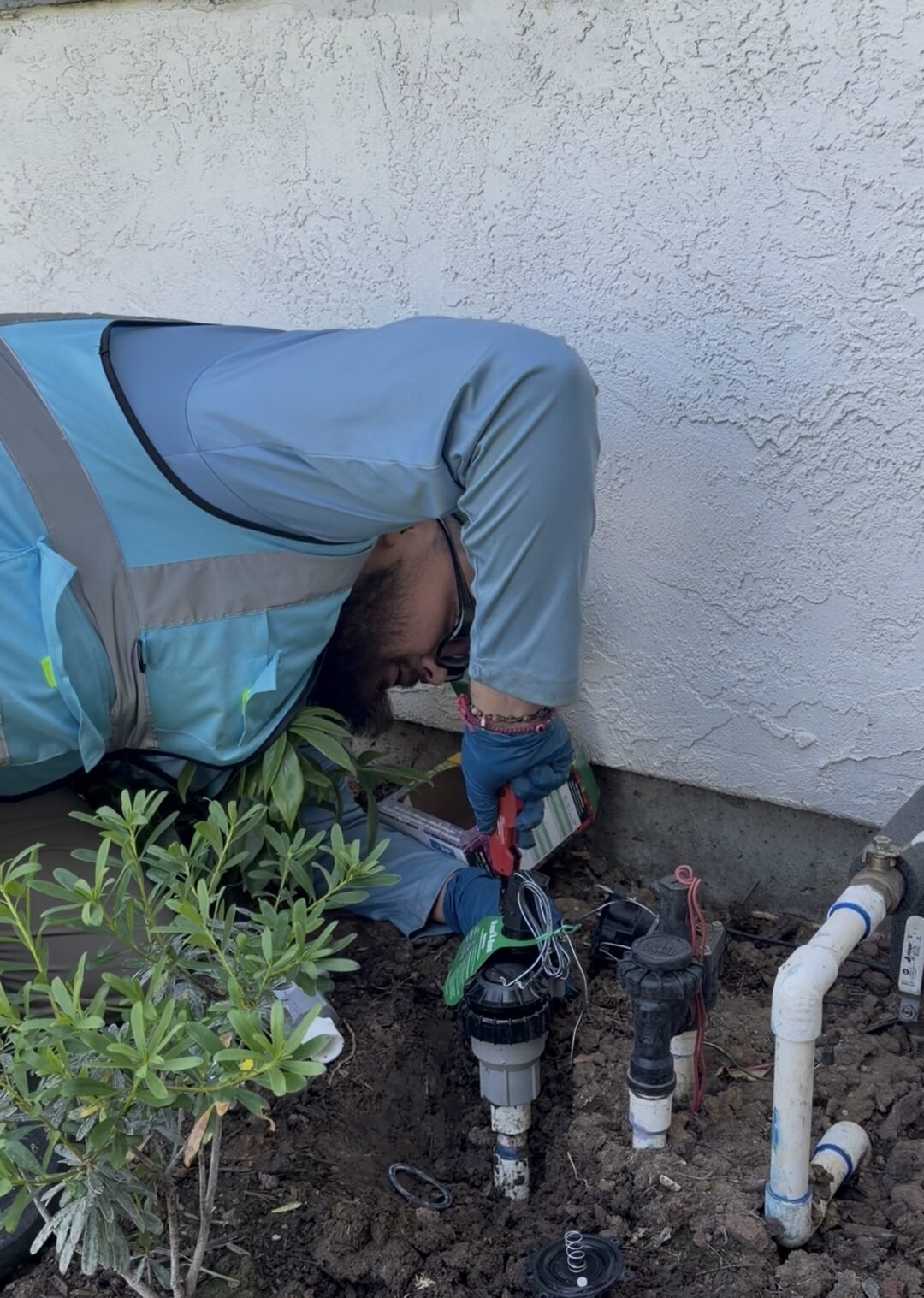 Wiring irrigation valves during a new sprinkler system install in Vacaville CA